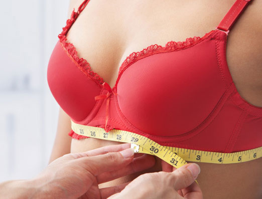woman-having-bra-fitting on lingerie briefs