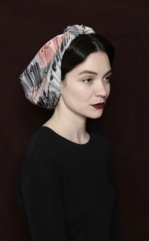 Andrea Pimentel modeling a SuTurno scarf 