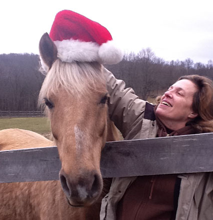 Ellen thinks Trigger is stylin' in his santa hat!
