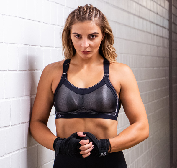 Christina Hammer, the current WBO & WBC Middleweight World Champion wearing Momentum Pro Sports Bra. Featured on Lingerie Briefs