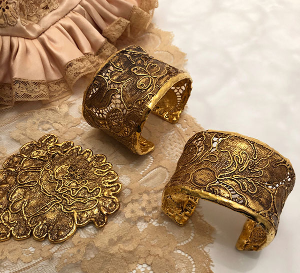 Gold plated bracelets and brooch from the Gilded Lace Collection by Monika Knutsson as featured on Lingerie Briefs