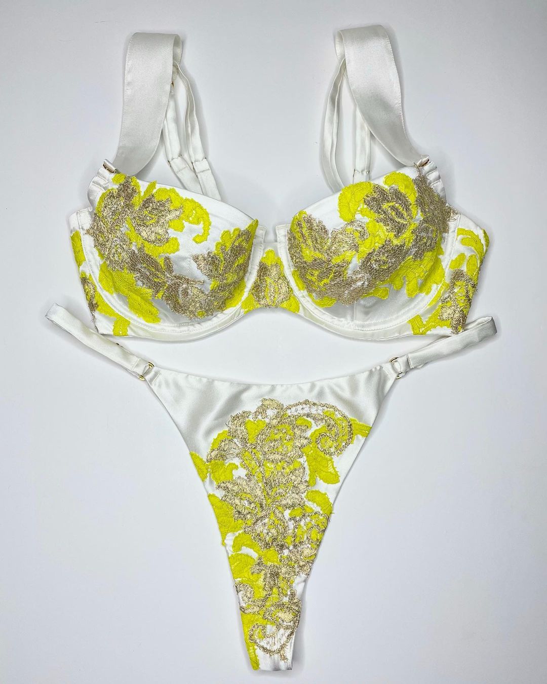 https://lingeriebriefs.com/wp-content/uploads/2021/05/Freolic-luxury-silk-and-lace-bra-set-white-and-yellow.jpg