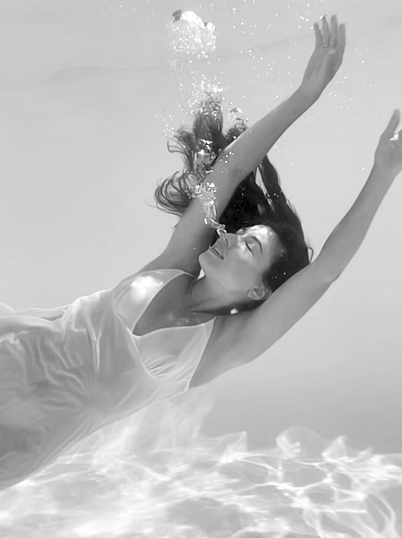 Kristina Eugenia in her underwater film for Christine Lingerie as featured on Lingerie Briefs